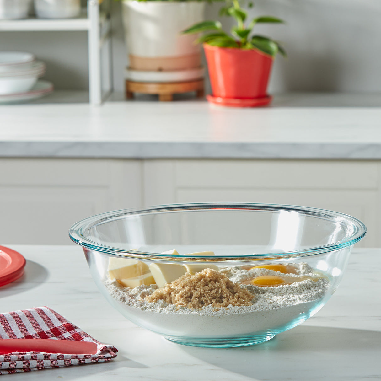 Mixing bowl with ingredients on marble table